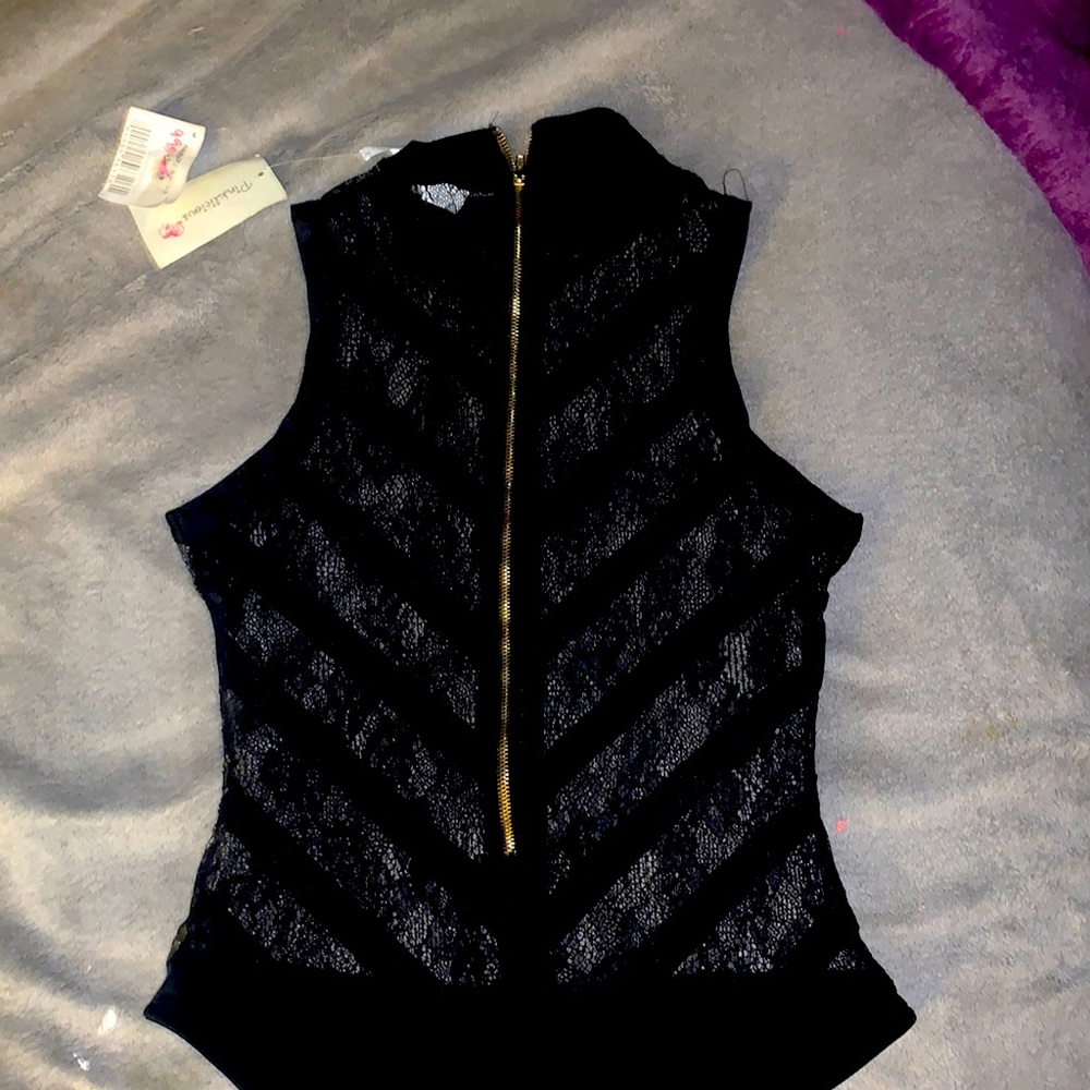 See through black bodysuit.
